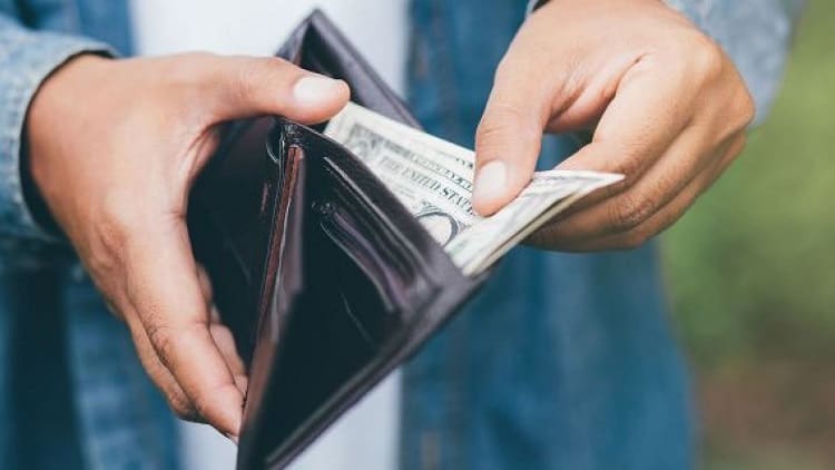 Taking Dollars From Wallet